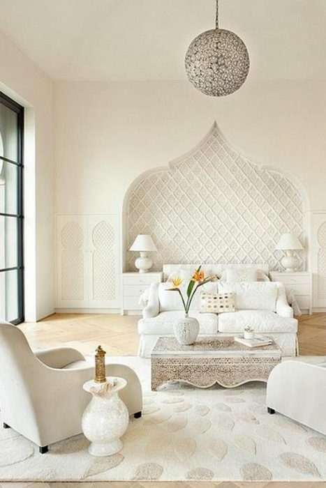 Elegant bedroom in white combines modern and Moroccan influences