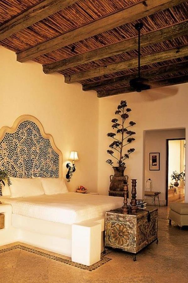 Luxurious Moroccan bedroom with rich decoration and neutral colors